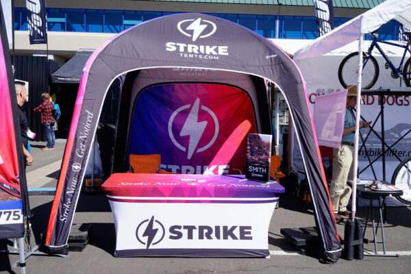 Inflatable tent and table cover at a outdoor trade show